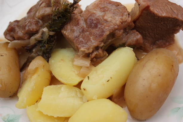 istock Veal with onions served with boiled potatoes 1363733078