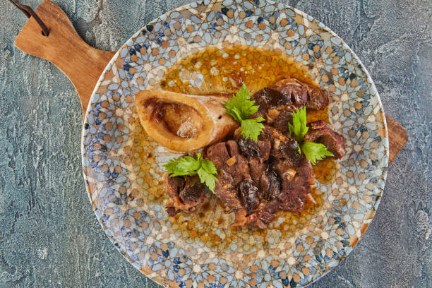 istock Ossobuco with spindle Beef, cognac and garlic black 1363733969