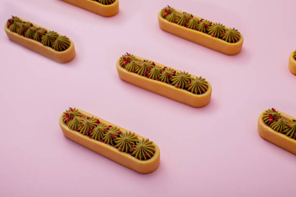istock pistachio tarts on pink background 1363741974