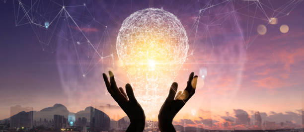 istock Creativity on connectivity.Innovative idea.Inspiration and network. Hands holding light bulbs as symbol of innovation on global city network connection concept. 1363744711