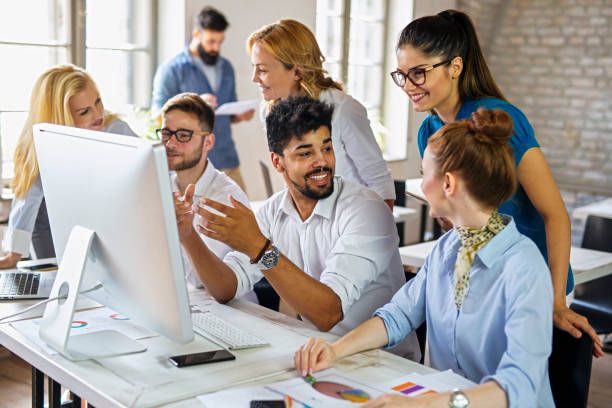 istock Group of multiethnic business people cooperating during business training 1363745920