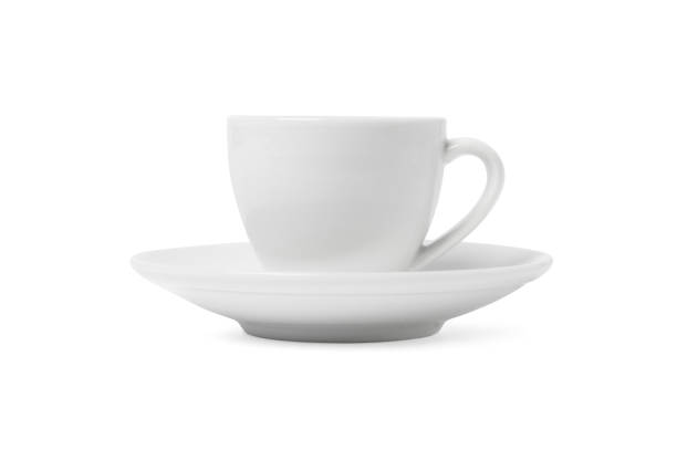 istock White cup and saucer isolated on white background. Ceramic coffee cup or tea mug and dish for drink close up. Mock up classic porcelain utensils 1363749249