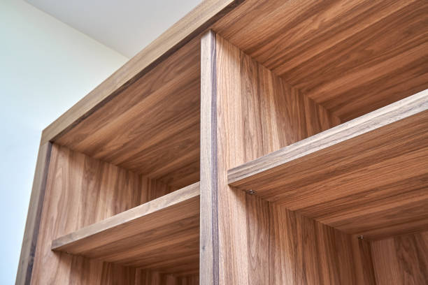 istock Cabinet of walnut solid veneer in empty walk-in closet 1363750189