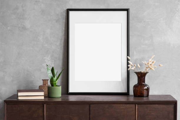 istock Artwork mock-up in interior design. Blank white picture frame on a wall 1363750569