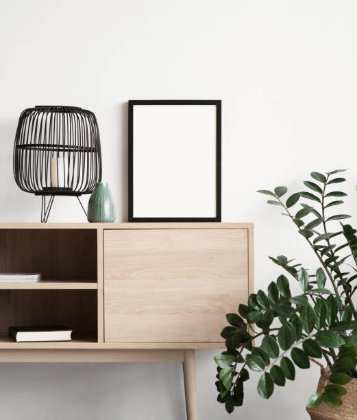 istock Artwork mock-up in interior design. Blank white picture frames on a wall 1363750570