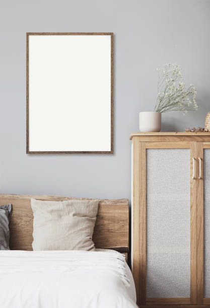 istock Artwork mock-ups in interior design. Blank white picture frame on a wall 1363750573