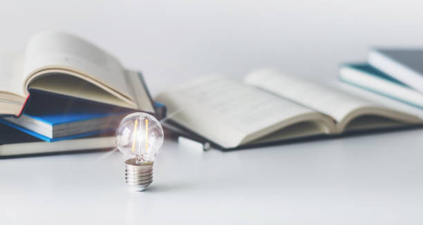 istock Bright light with book. Business success idea and studying concept 1363751684