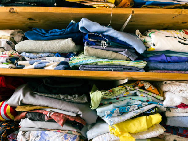 istock Scraps of fabric on the shelf of a textile workshop 1363754152