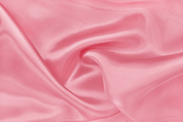 istock Rose gold fabric texture background, detail of silk or linen pattern. 1363754290