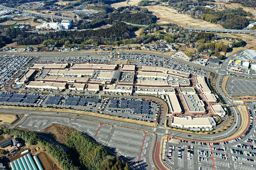Aerial view of the United States Pentagon, the Department of Defense headquarters in Arlington, Virginia, near Washington DC, with I-395 freeway and the Air Force Memorial and Arlington Cemetery nearby.