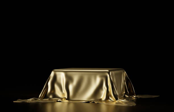 istock An empty pedestal covered with a golden cloth. 3D rendering illustration. 1363756654