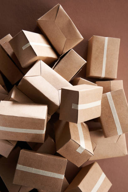 istock heap of brown cardboard box ready for delivery. 1363757212