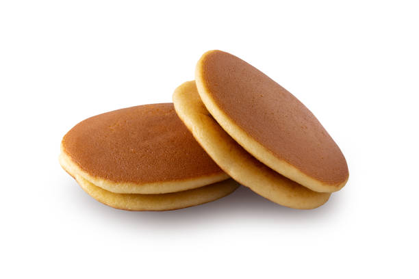 Dorayaki is japanese pancakes isolated over white background