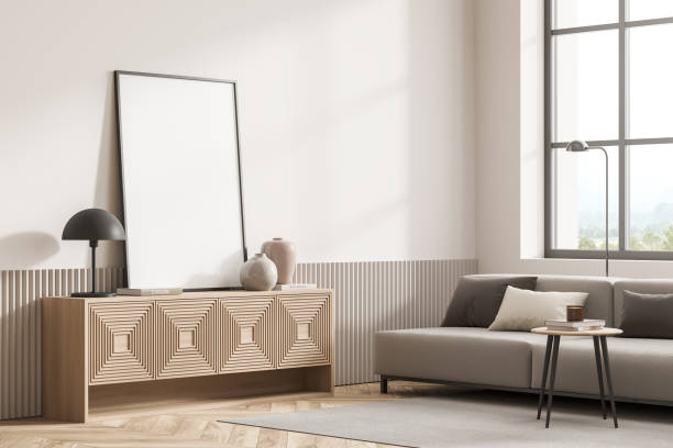 istock Bright living room interior with empty white poster, sofa 1363764715
