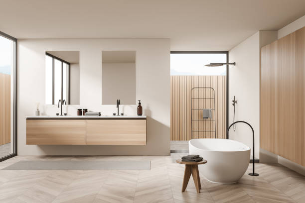 Wooden bathroom interior with bathtub and two sinks, shower and towel ladder Light bathing room interior with tub and two sinks with mirrors, douche and rail ladder on background, parquet floor and table. 3D rendering domestic bathroom stock pictures, royalty-free photos & images