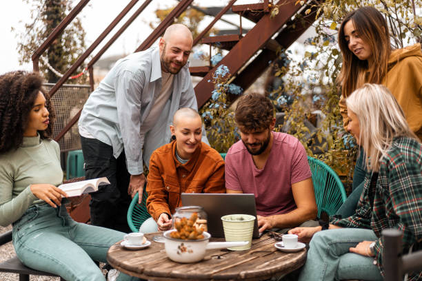 istock Multicultural group of students co-working together in the university rooftop common area. 1363766955