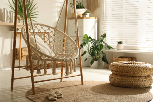 istock Comfortable hammock chair in stylish room. Interior design 1363767048