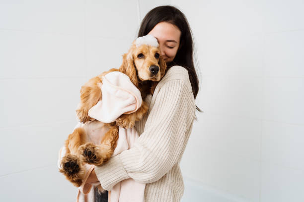 istock Woman with a Lovely Dog taking a bathroom 1363767061