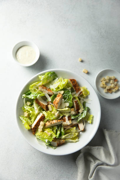 istock Homemade Caesar salad with chicken 1363767601