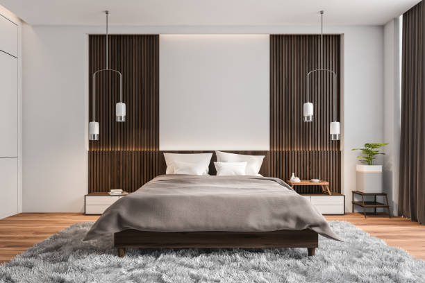 istock Modern white and grey bedroom with wood details 1363769256