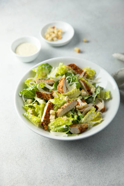 istock Homemade Caesar salad with chicken 1363769311