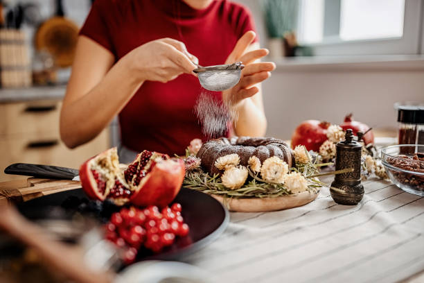 istock Decorating kugelhopf cake with icing sugar 1363769859