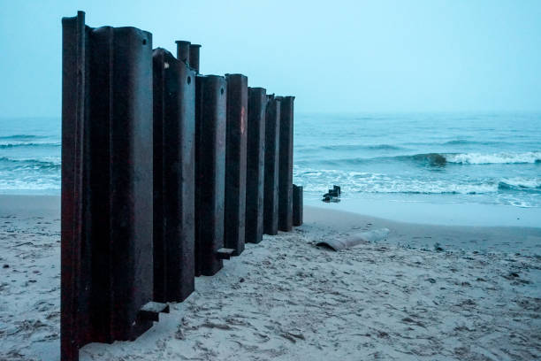 istock Piece of metal on a shore 1363771297