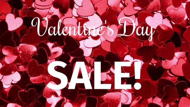 Animation of valentine's day sale text over pink hearts