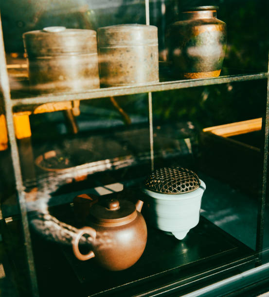 Chinese culture tea ceremony. Chinese tea set kettle and cup on table.