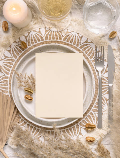 istock Boho Wedding Table place with Blank card on plate near pampas grass 1363773143