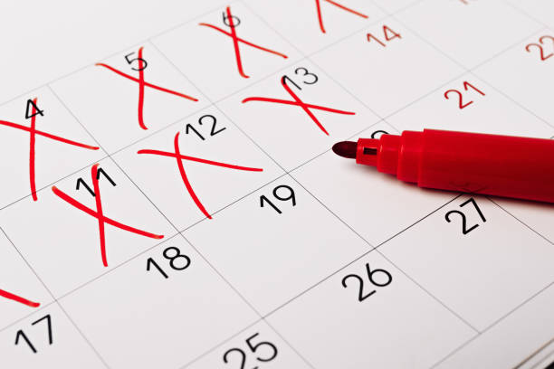 istock close up of a calendar page with red pen 1363773787