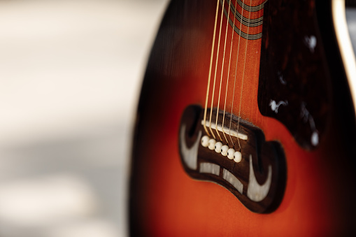 Guitar strings, close up. Bass Guitars. Close up of music guitar. Musical instrument for rock, blues, metal songs. selective focus.