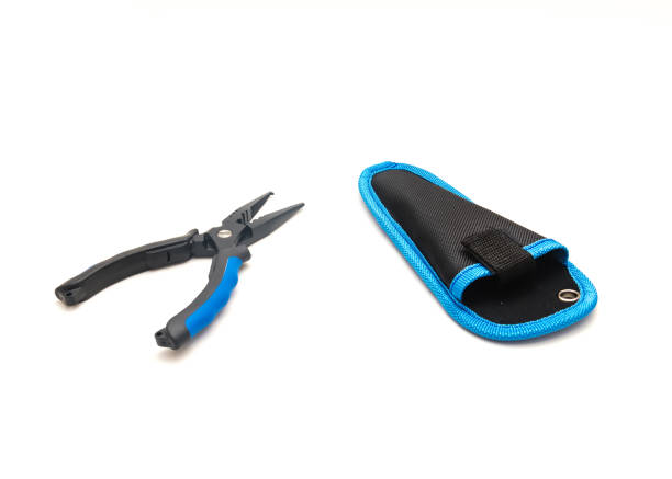 Fishing pliers with travel case isolated on white background. Stainless steel jaw and split ring nose multi-function fishing tool with rubber handle.