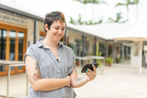 istock Happy woman making a video call on a mobile phone 1363777129