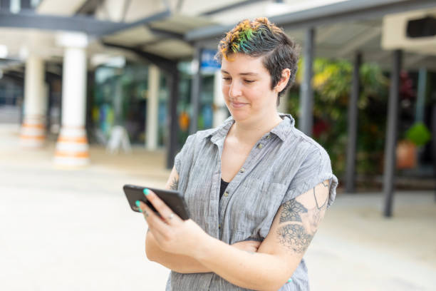 istock Happy woman making a video call on a mobile phone 1363777131