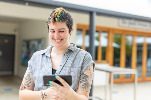 istock Happy woman making a video call on a mobile phone 1363777154