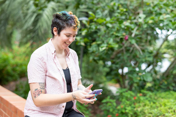 istock Happy woman making a video call on a mobile phone 1363777158
