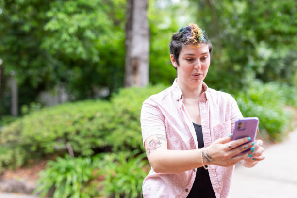 istock Happy woman making a video call on a mobile phone 1363777174
