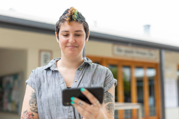 istock Happy woman making a video call on a mobile phone 1363777190