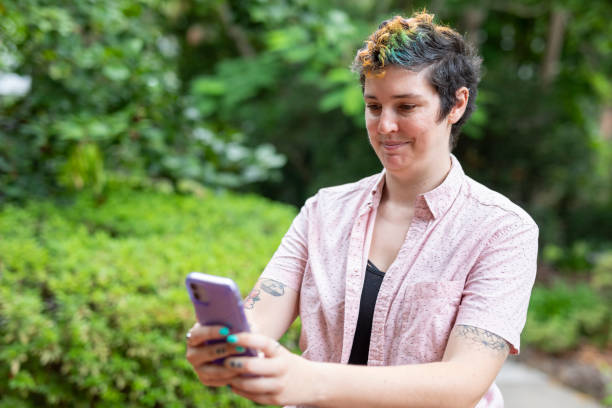 istock Happy woman making a video call on a mobile phone 1363777222