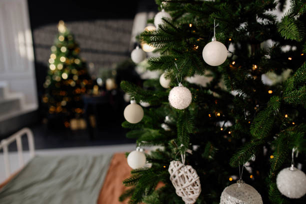 istock christmas tree with white balls in the apartment 1363779839
