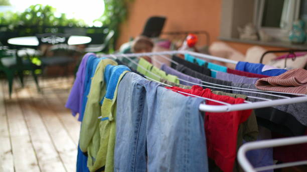 istock Drying of colourful clothes. Laundry drying racks 1363781113