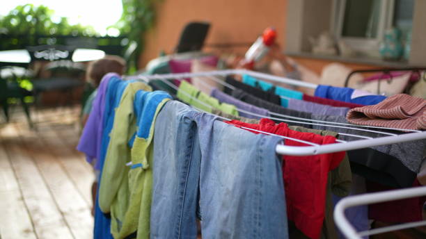istock Drying of colourful clothes. Laundry drying racks 1363781202
