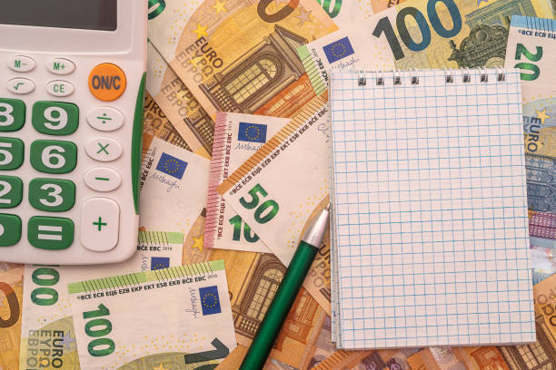 istock empty notepad memo with pen on euro money 1363782899