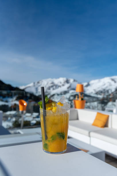 istock Mango cocktail at Ski Slopes on a sunny day 1363788981