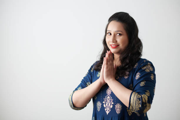 istock Woman Making Namaste Gesture 1363794824