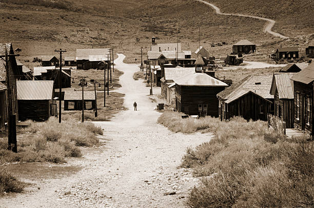 California Ghost Town The main street through the abandoned mining town, Bodie, California. ghost town stock pictures, royalty-free photos & images