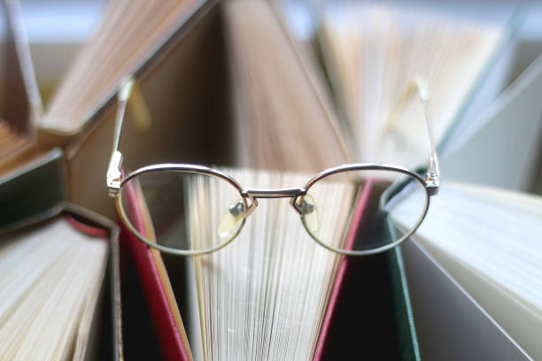istock Hardcover Books and Reading Glasses 1363796512