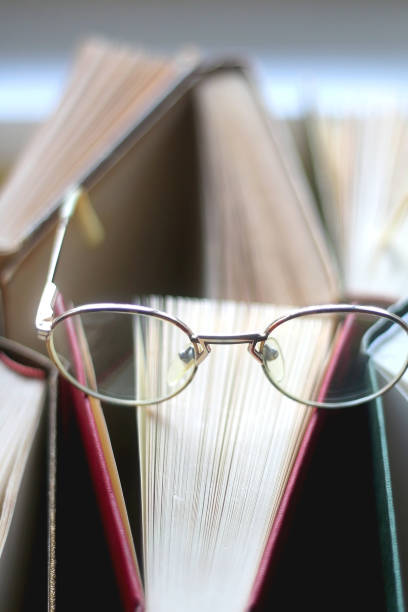 istock Hardcover Books and Reading Glasses 1363796513