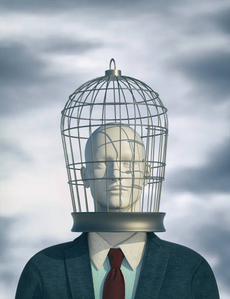 istock Businessman with a bird cage head. 1363798158